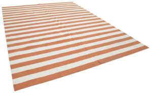 orange and white striped rug