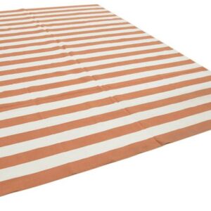 orange and white striped rug