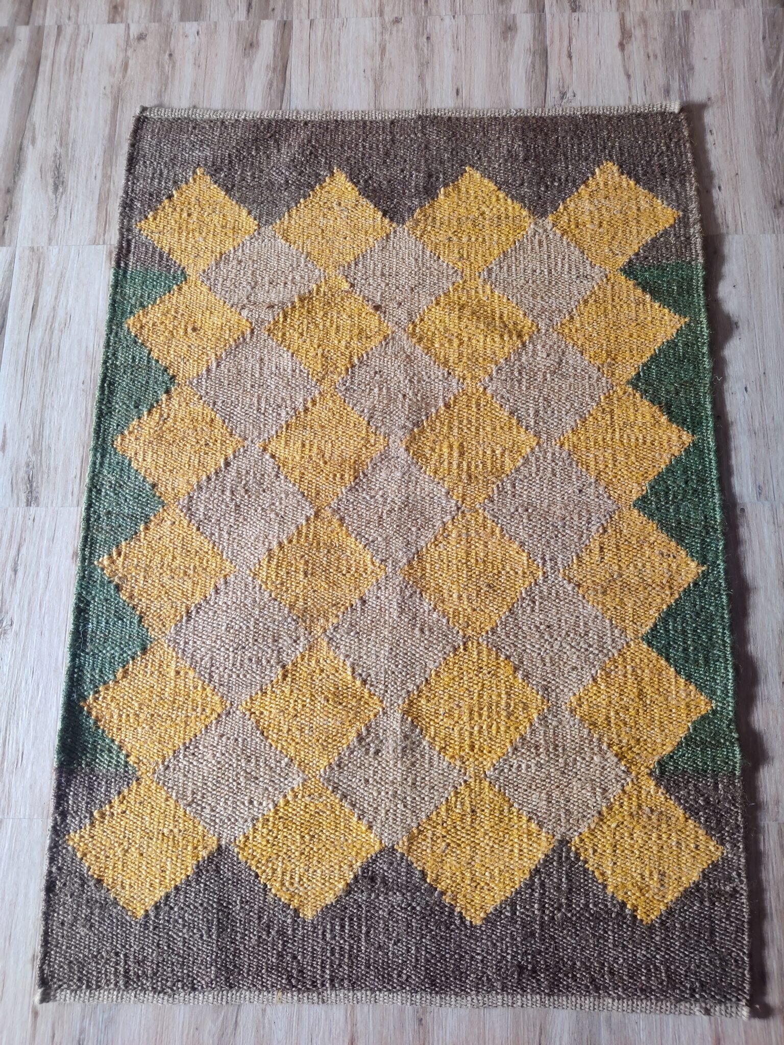 green and yellow area rug