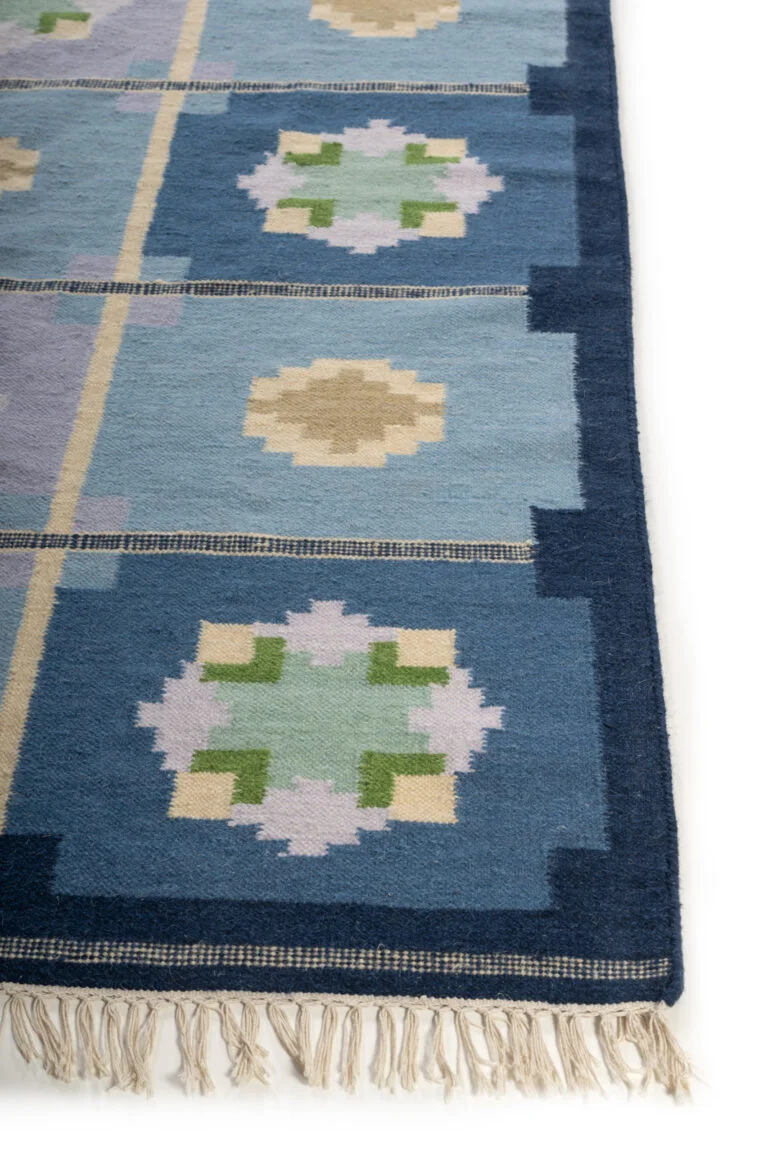 Handmade rug styling for refined interiors
